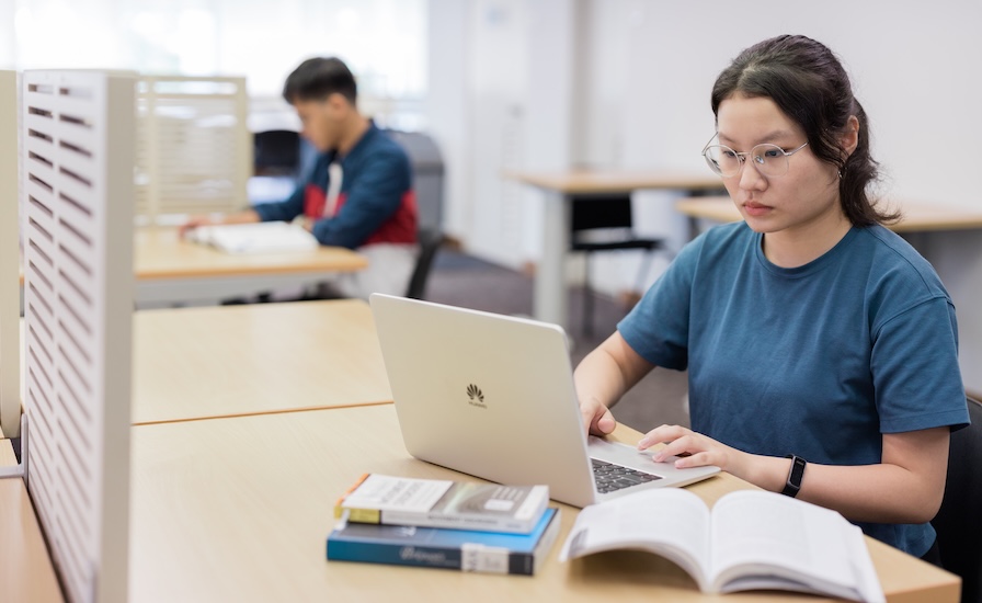 Student writing a personal statement for university