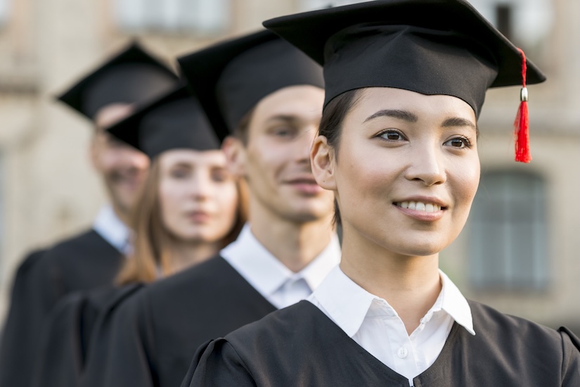 A group of students celebrating their graduation