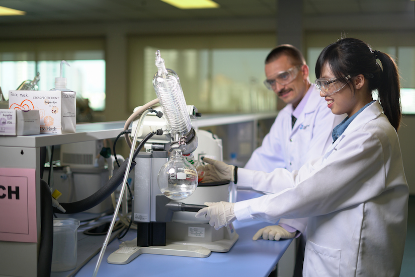 Students conducting pharmacy lab work at Monash Malaysia, gaining practical skills