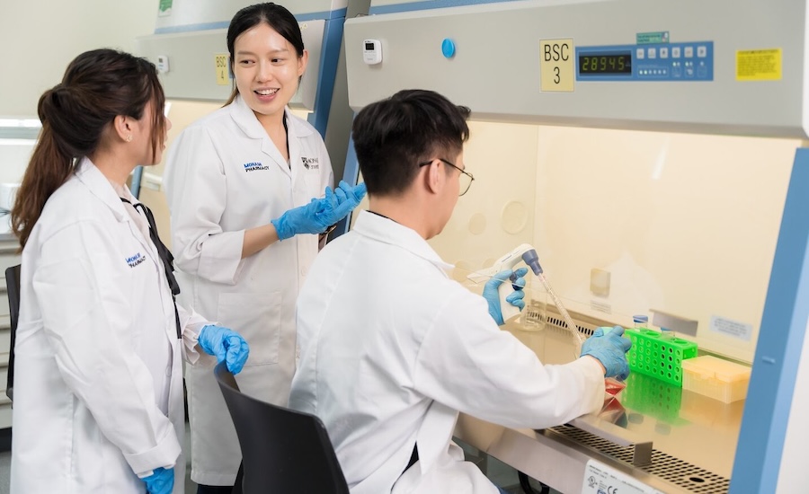 Pharmacy students doing experiment at Monash 