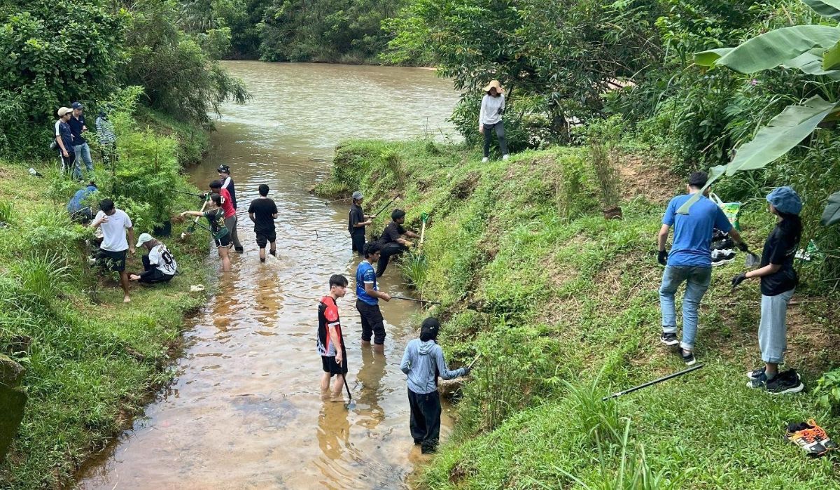 flood mitigation team in the river