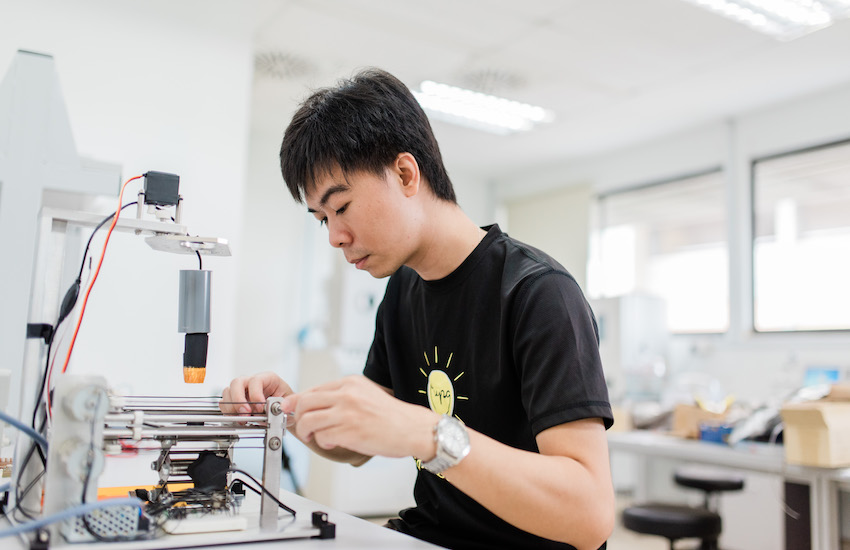 electrical engineering student doing research in lab