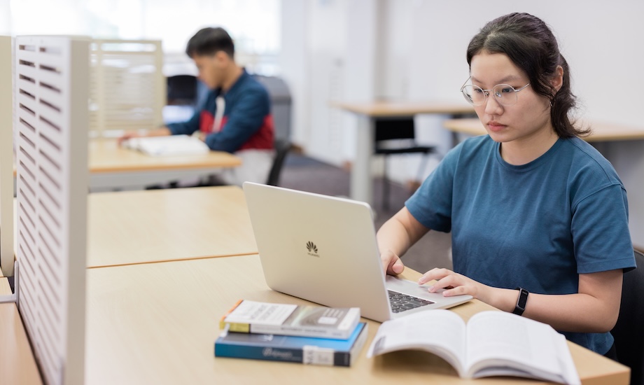 Student studying Monash Malaysia campus study space