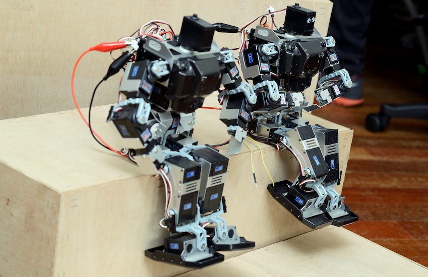 Humanoid robots used by students to explore artificial intelligence and robotics concepts