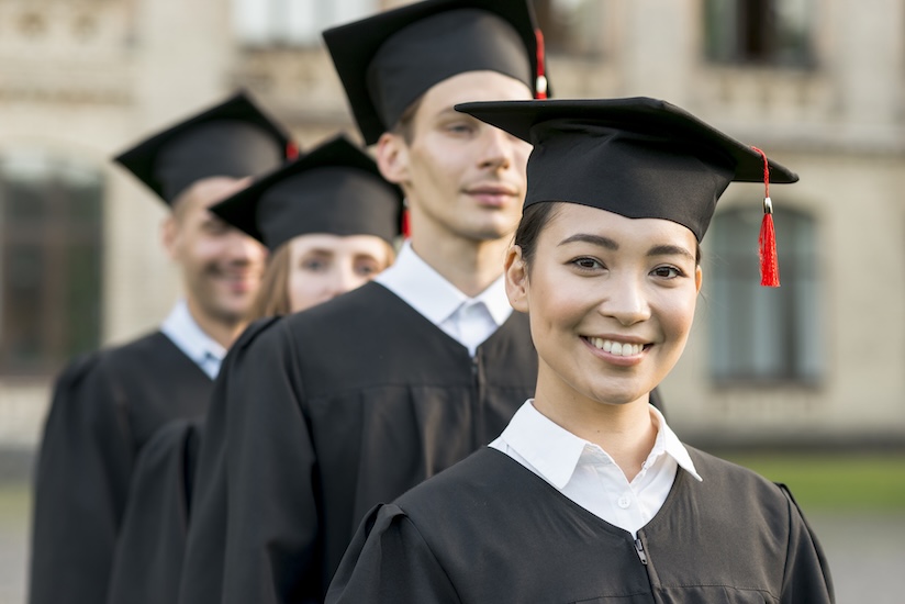 students celebrating their graduation