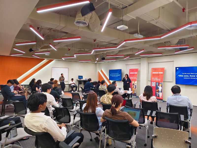 Finalists showcase their innovative solutions as judges and fellow participants observe.
