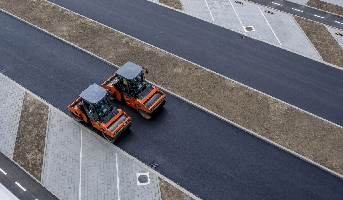 tractors sweeping asphalt