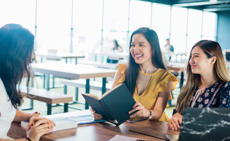Postgraduate Diploma students collaborating in a study session at Monash Malaysia.