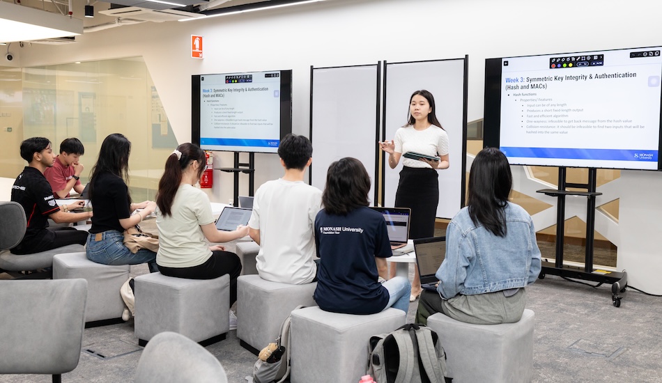 Monash IT students attending a lecture on Symmetric Key Integrity and Authentication