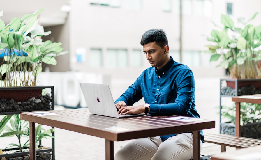 Student analysing datasets on a laptop as part of data science learning