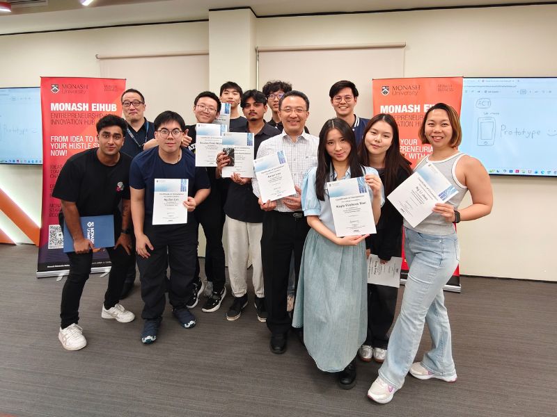 Participants of the 2026 Design Thinking Bootcamp pose for a group photo with EIHUB Director Dr Daniel Loy.